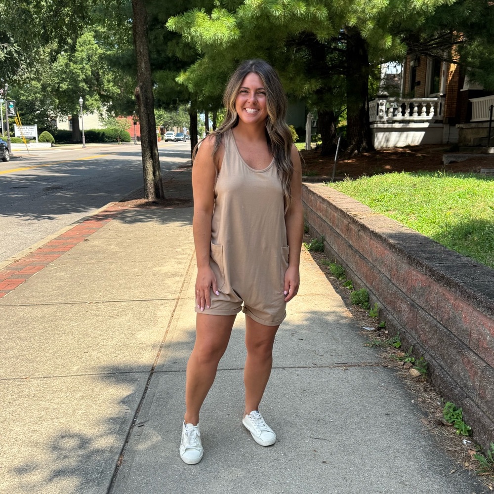 Opened back, athletic style romper